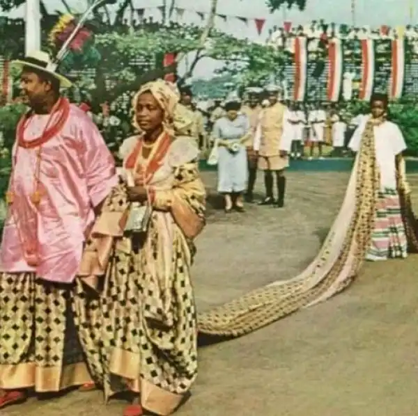 Photo of Festus Okotie-Eboh, former Minister of Finance and wife followed with a girl tied with wrapper on her neck